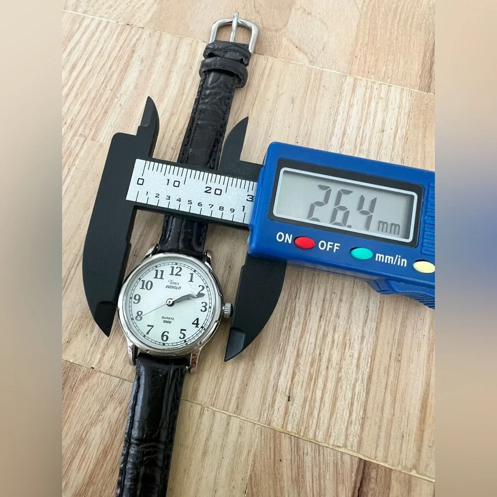 Timex ladies silver tone black leather watch NEW BATTERY